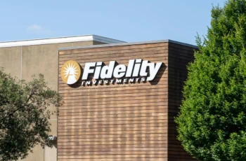 A Fidelity Investments sign on the side of a brown building.