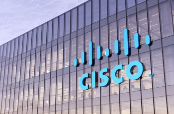 Cisco sign on the side of a glass building.