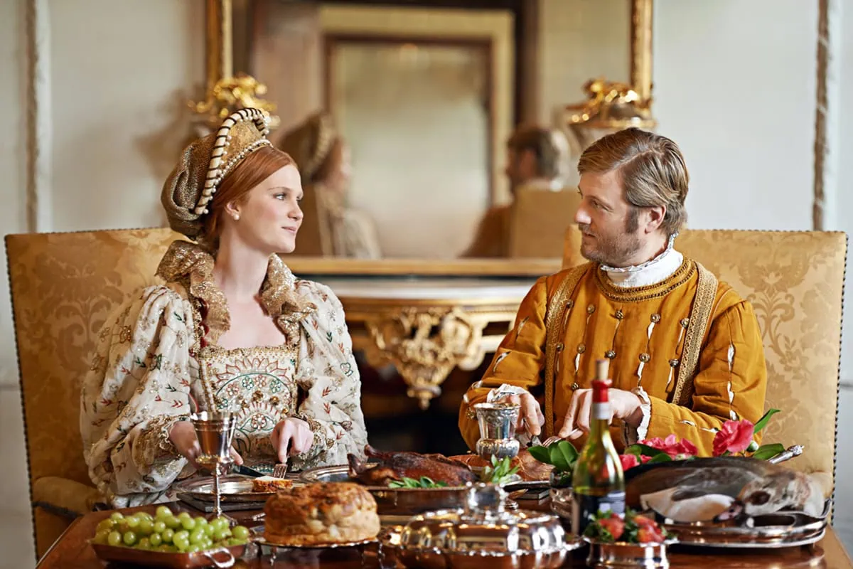 Dividend Kings: The Full List of American Dividend Royalty 3 A royal couple eats a lavish feast.