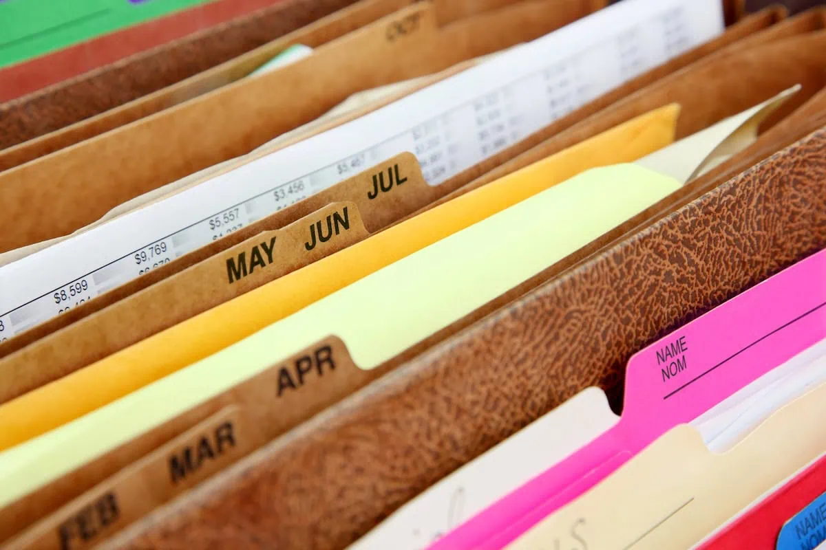 Financial Caregiving: How to Manage a Loved One's Finances 9 file folders may jun jul tax brackets 1200