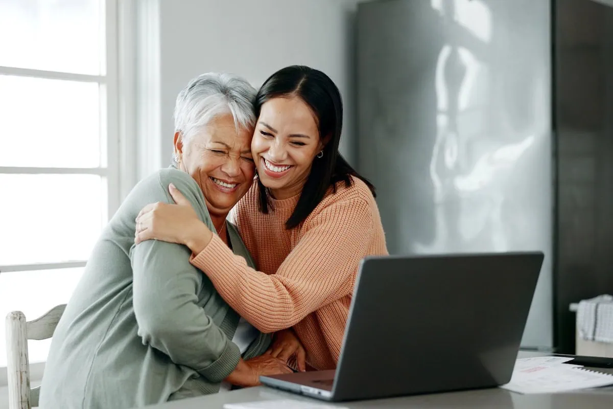 What to Do With Your Assets If You Don't Have Heirs 3 mother daughter financial caregiving laptop
