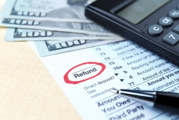 the word refund is circled in red on a tax form.