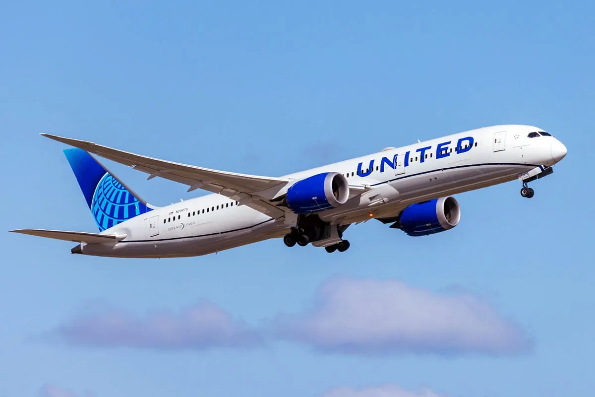 7 Best Value Stocks to Buy Right Now 8 A United Airlines jet in the sky.