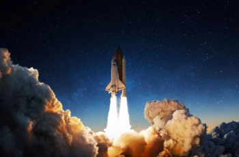 A launch of a space shuttle against a starry sky.
