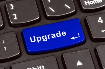 A keyboard key that reads upgrade.