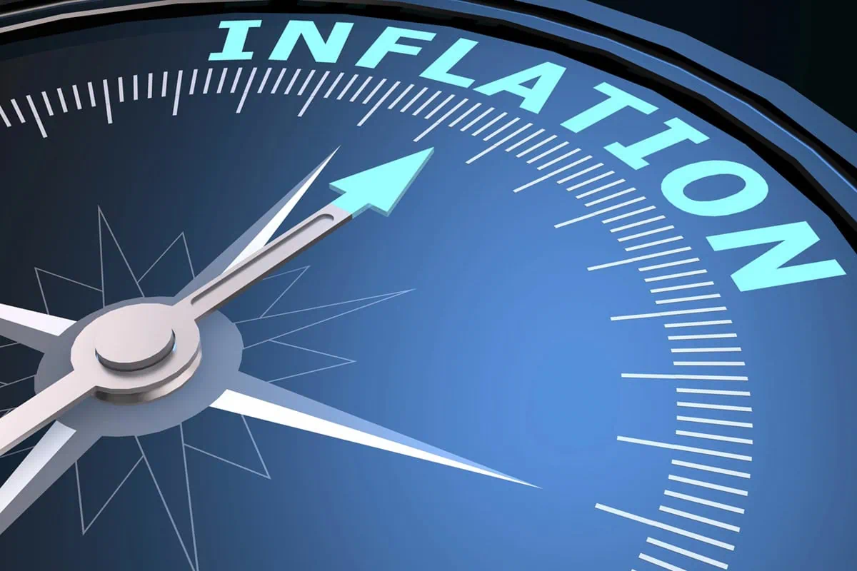 2026 Second-Half Market Outlook: Stocks, Rates + More 3 A compass that's pointing to the word inflation.