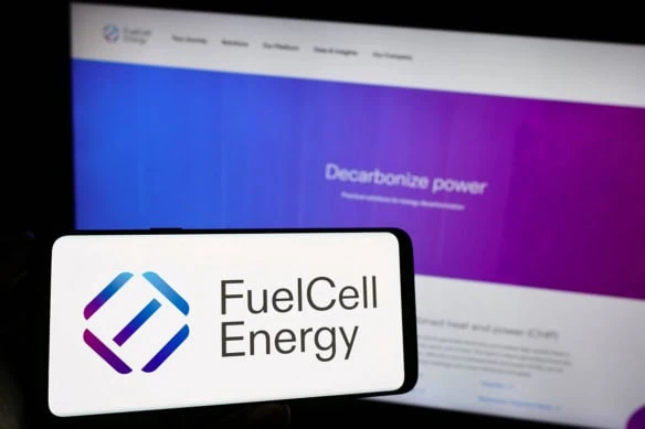 the fuelcell energy logo on a smartphone and a laptop.