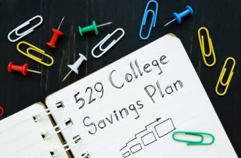 A notebook with 529 college savings plan written on it.