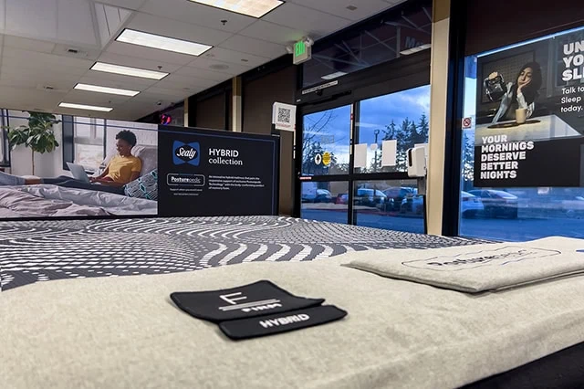 7 Best Growth Stocks to Buy for the Rest of 2026 21 A mattress store showing Sealy mattresses.