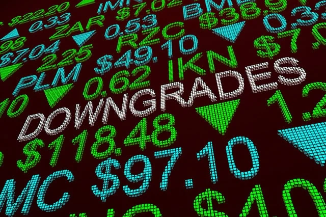 Pros Cut Meta Platforms (META) Stock Targets After Q2 Miss 2 concept art of a ticker board with the word downgrades.