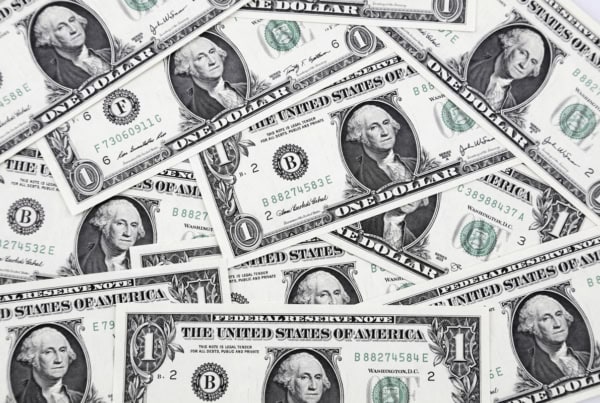 a group of one-dollar bills.