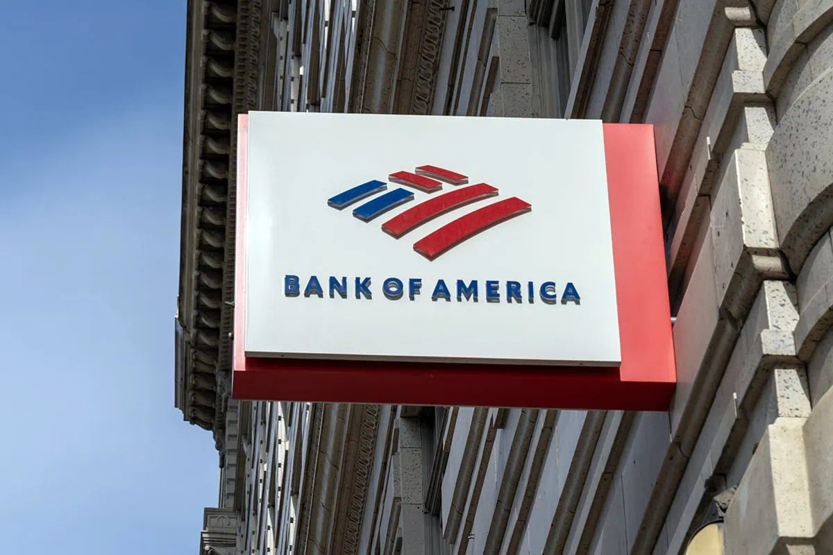7 Best Value Stocks to Buy Right Now 4 a small bank of america sign juts out of a city building.