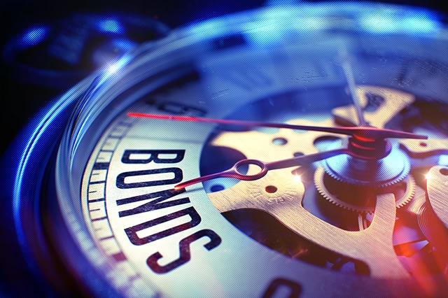 concept art of a watch dial pointing to the word "bonds."