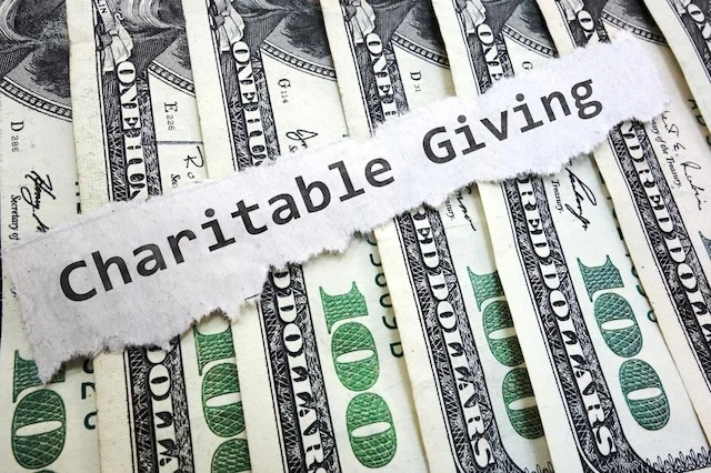 charity charitable giving dollar bills donation