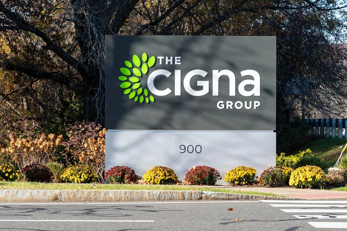 a cigna group sign outside an office complex.