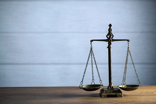 VTI vs. SPY: Which is the Better ETF to Buy? 3 a set of scales.