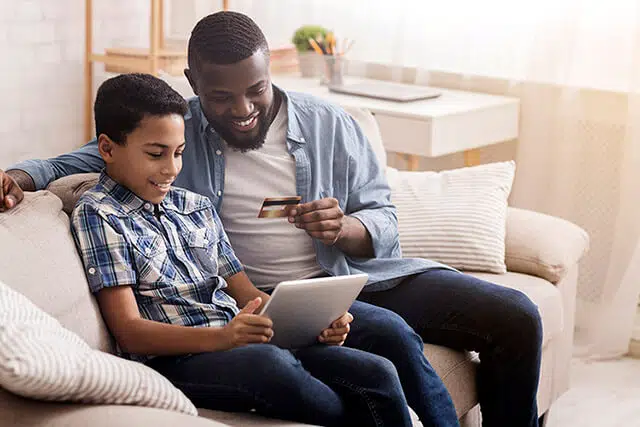 credit debit card father son computer