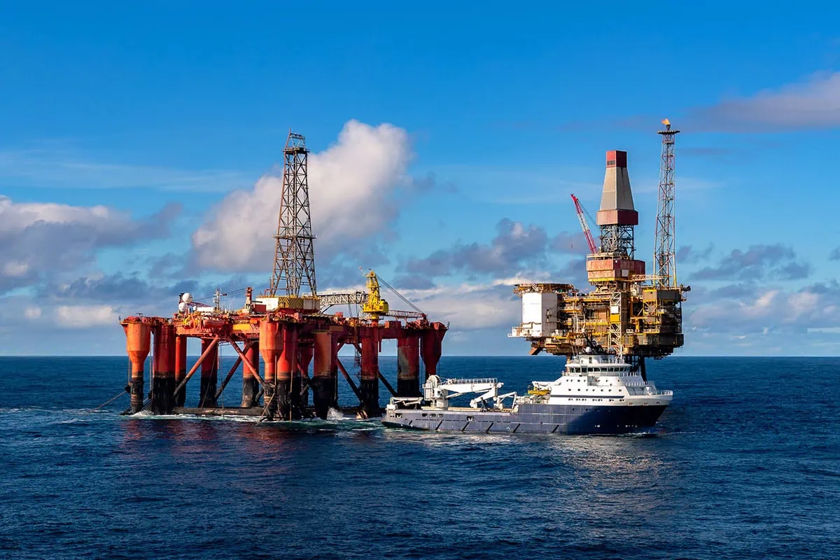 5 Best Energy ETFs for the Rise of Oil, Natural Gas + More 3 an ocean oil rig is shown.