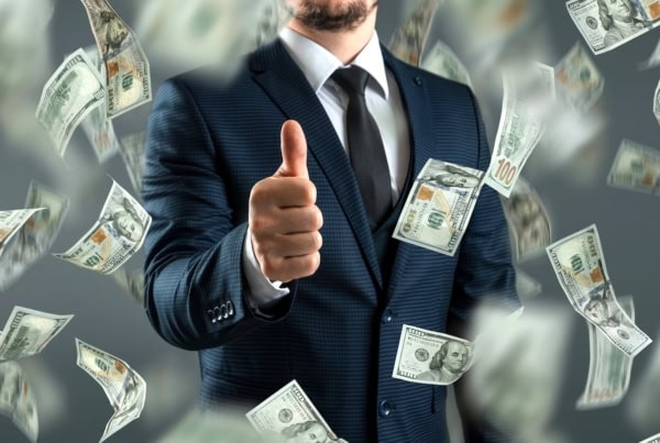 dividend growth cash thumbs up suit 1200