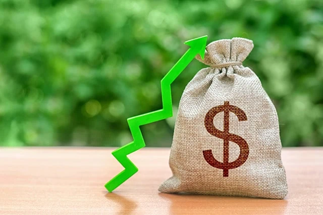 8 Best T. Rowe Price Funds to Buy for 2026 5 a green line pointing upward rests against a sack of money.