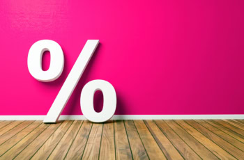 a giant percent sign against a pink background.