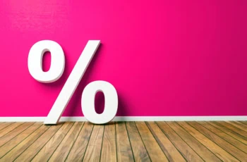a giant percent sign against a pink background.