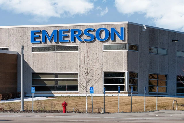 14 Dividend Kings for Royally Resilient Income 12 Emerson Electic manufacturing facility and trademark logo.