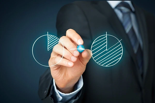 7 Best Fidelity Retirement Funds for IRA Investors 8 a business person draws two virtual pie charts.