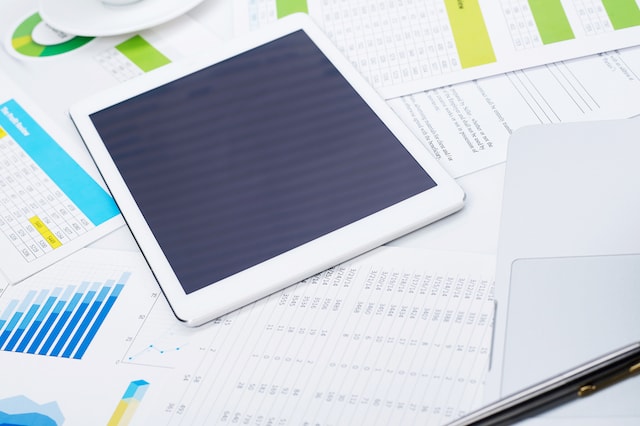 financial documents charts tablet