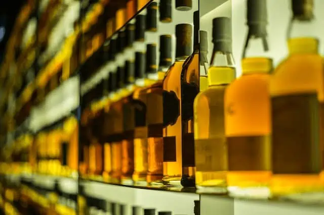 how to invest in whiskey bottles