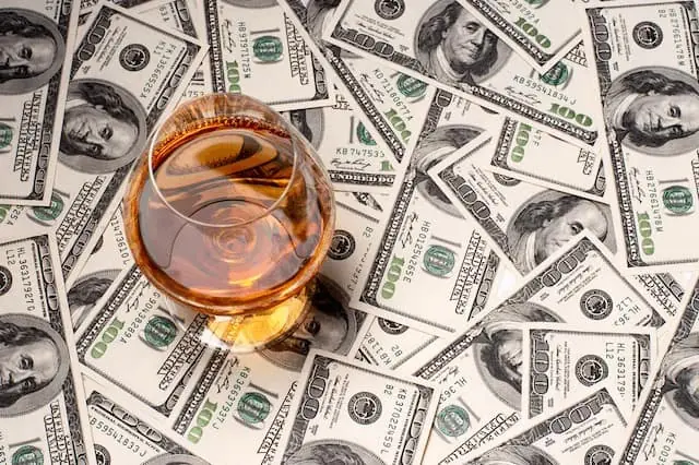 how to invest in whiskey glass cash stocks