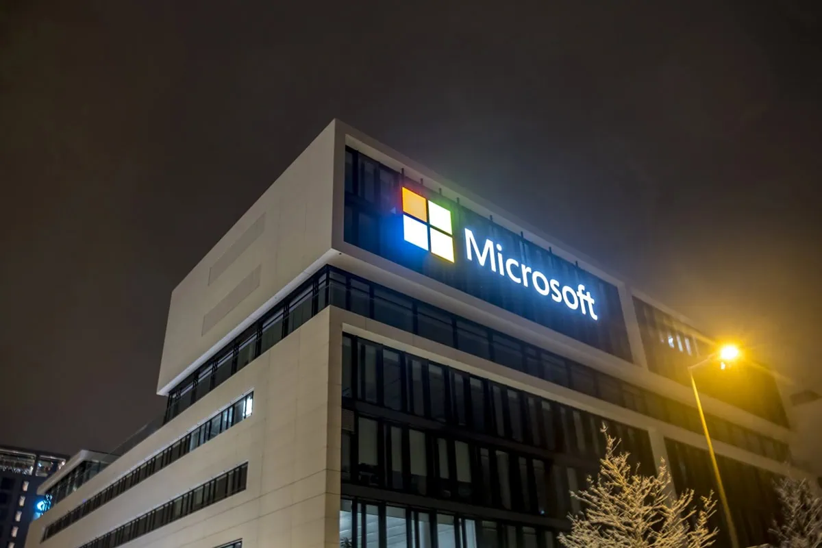 Wall Street Loves These 10 Dividend-Growth Stocks 13 a microsoft building at night.