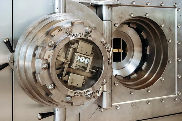 Best Vanguard Funds to Hold in an HSA 5 a large bank vault door in a bank in lisbon portugal.