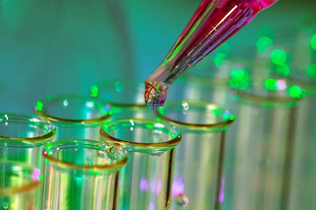 7 Best Growth Stocks to Buy for the Rest of 2026 9 pipette adding fluid to one of several test tubes.