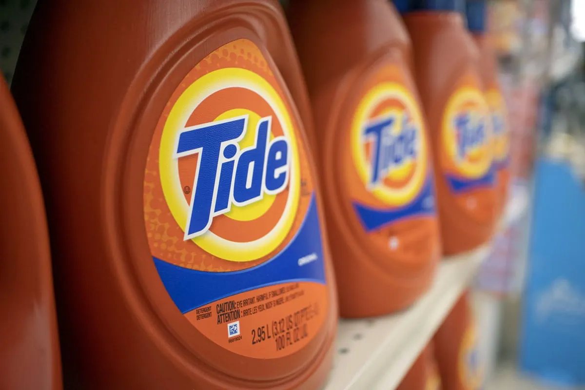 15 Dividend Kings for Royally Resilient Income 7 Tide laundry detergent on a grocery store shelf.