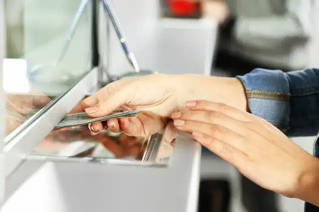 savings account deposit bank teller