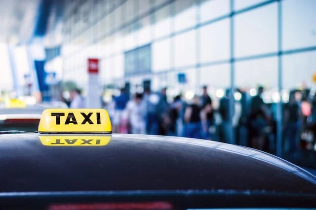 senior travel scam airport taxi