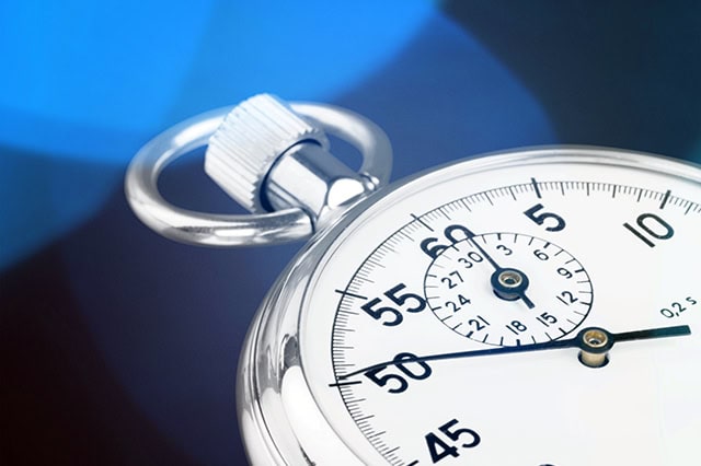 a stopwatch against a blue background.