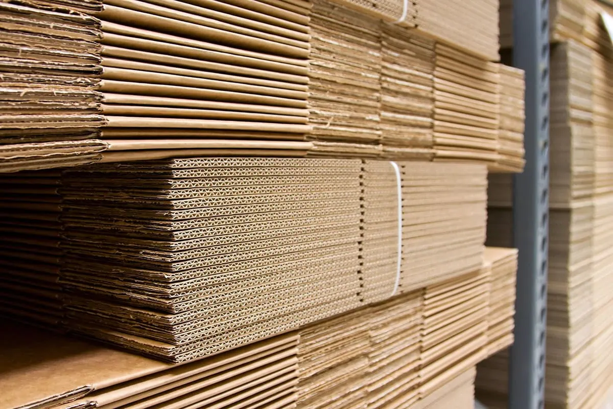 Wall Street Loves These 10 Dividend-Growth Stocks 11 several stacks of folded cardboard boxes.