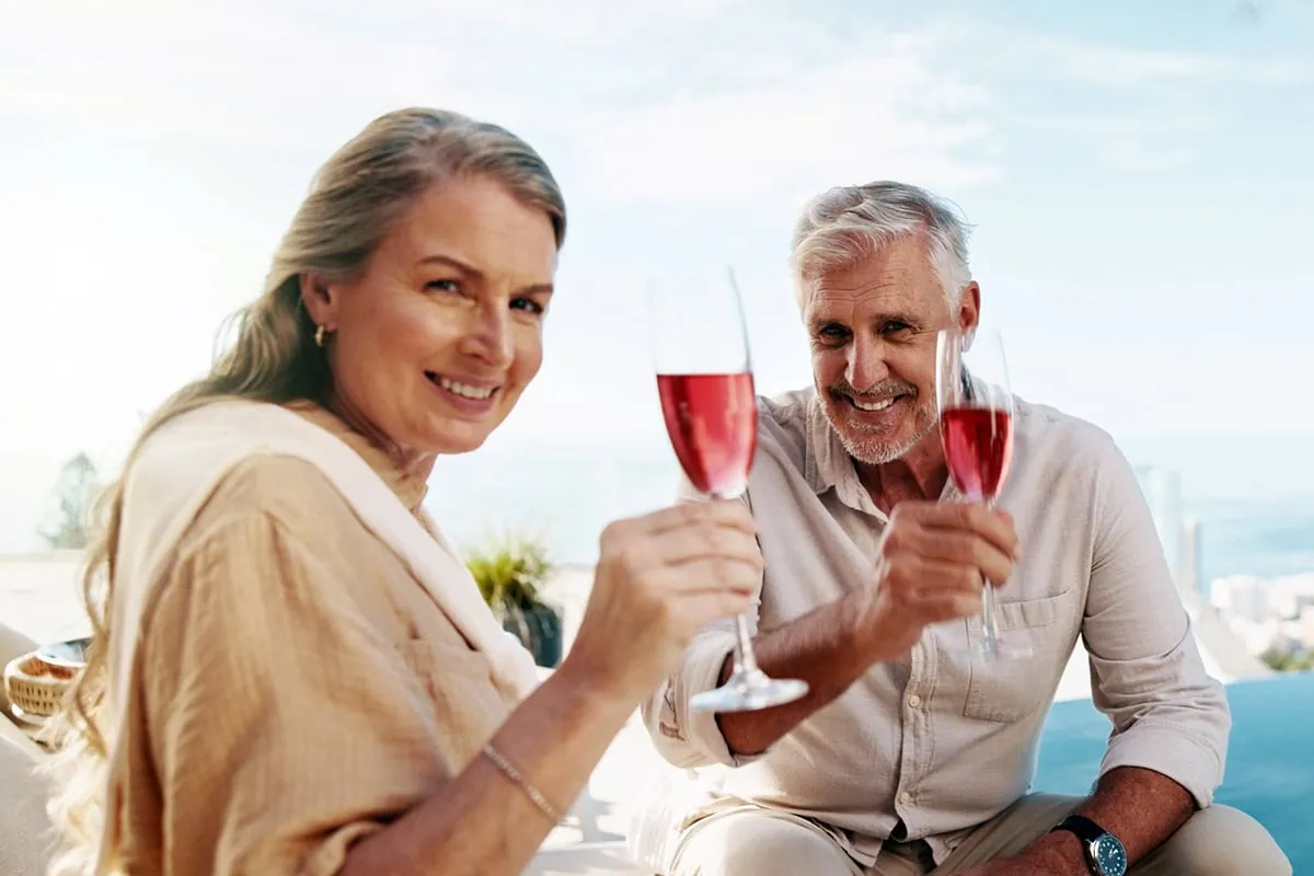 Avoid Retirement Anxiety: 10 Tips That Will Help You Retire With Confidence 10 social security senior couple wine wealthy vacation 1200