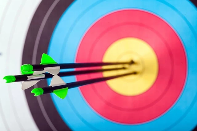 Argus Lifts Price Target on Delta Air Lines (DAL) Stock 2 several arrows in an archery target.