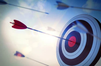 arrows hitting targets are blurred by a camera effect.