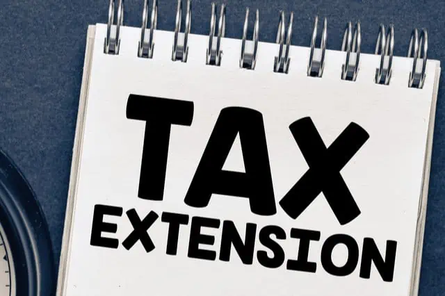 tax extension written on note pad