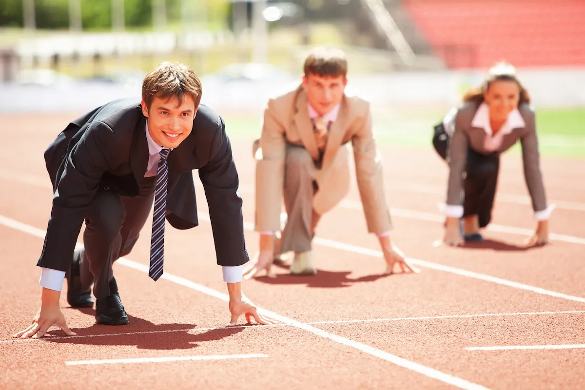 Early-Career Financial Tips That Could Change Your Life 2 professionals starting a race