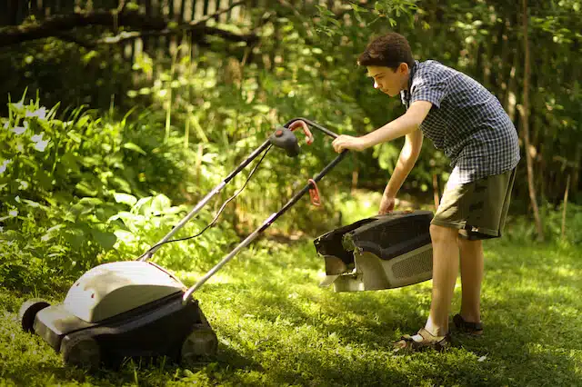 teen mowing lawn part-time job