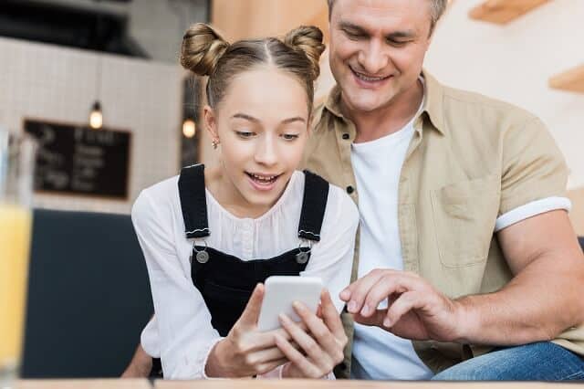 teenager parent managing money smartphone medium