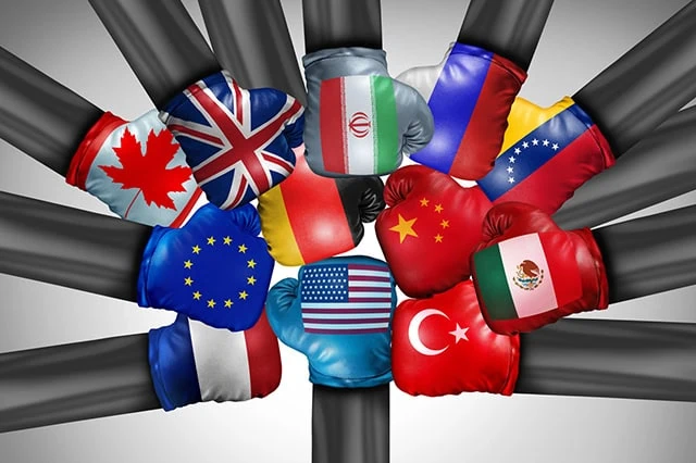 a united states boxing glove tries to punch boxing gloves of many other countries.