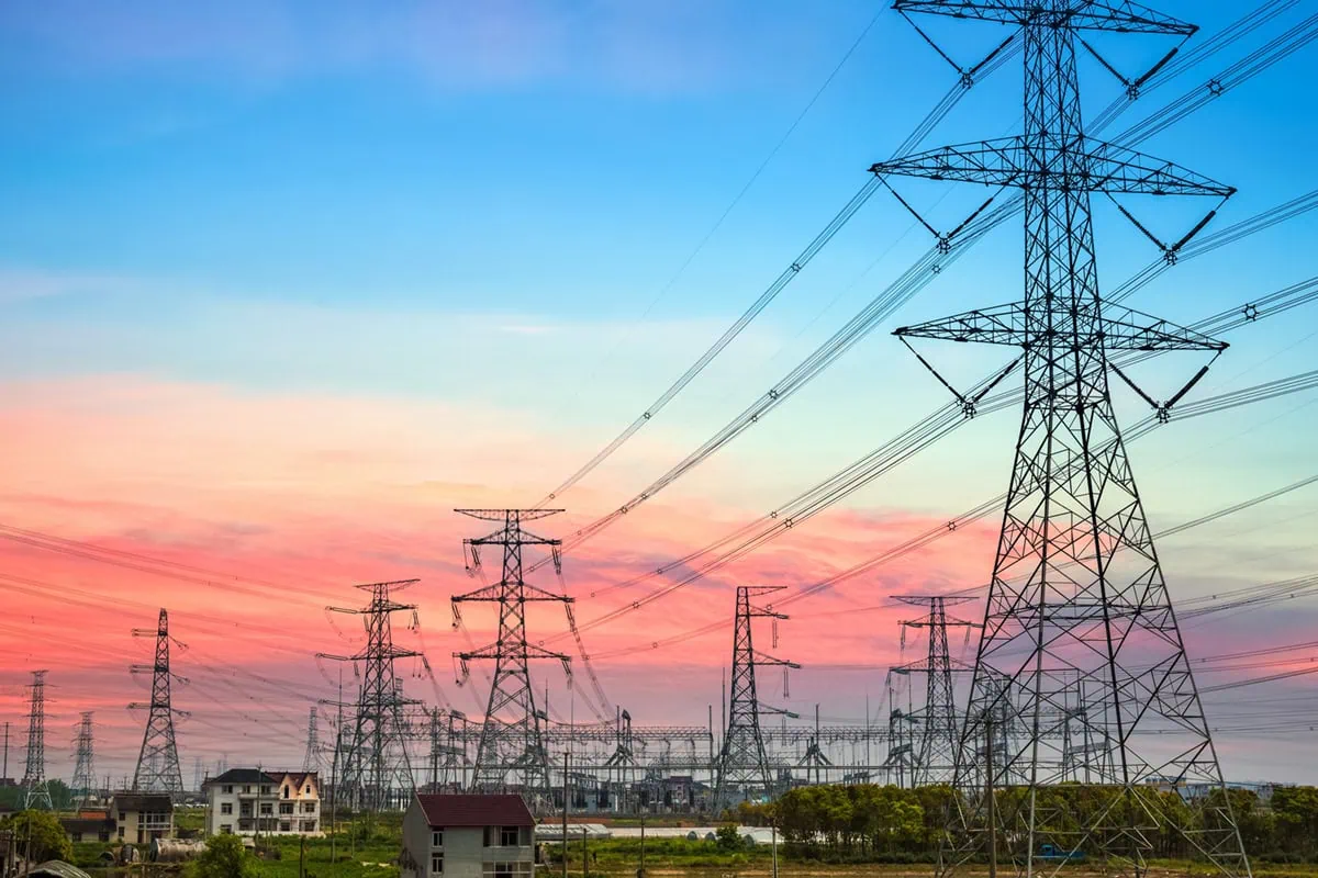 The 16 Best ETFs to Buy for a Prosperous 2026 3 electric lines against a sunset.