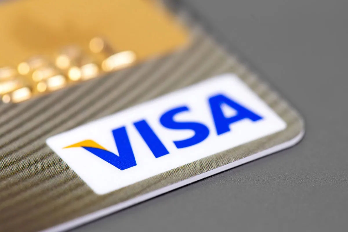 Wall Street Loves These 10 Dividend-Growth Stocks 10 a visa credit card with gold trim.