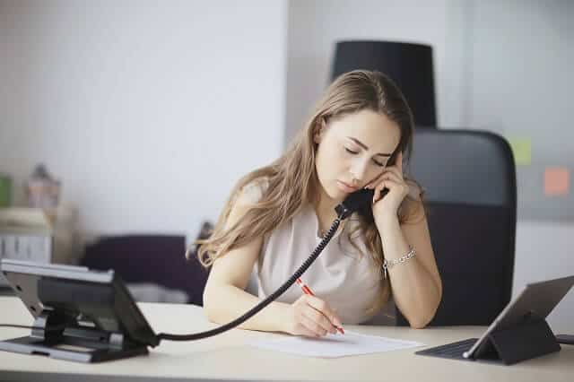 woman on phone and red pen 1